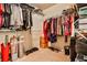 Large walk-in closet with ample shelving and hanging space at 738 Key Largo Ct, Auburn, GA 30011