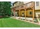 Spacious backyard with patio and deck at 738 Key Largo Ct, Auburn, GA 30011