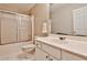 Clean bathroom with a shower/tub combo, white vanity, and tile floor at 738 Key Largo Ct, Auburn, GA 30011
