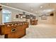 Finished basement recreation room with foosball table, seating area, and game-ready atmosphere at 738 Key Largo Ct, Auburn, GA 30011