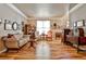 Spacious living room with hardwood floors and antique furnishings at 738 Key Largo Ct, Auburn, GA 30011