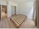 Cozy bedroom with platform bed and access to upstairs hallway at 388 Oakhaven Way, Villa Rica, GA 30180