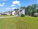 Two-story house with attached garage and landscaped lawn at 388 Oakhaven Way, Villa Rica, GA 30180