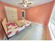 Spacious bedroom with double doors and a window at 388 Oakhaven Way, Villa Rica, GA 30180