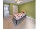 Bright bedroom with ceiling fan and spacious closet at 388 Oakhaven Way, Villa Rica, GA 30180