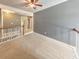 Spacious upper hallway with neutral walls and carpeted flooring at 388 Oakhaven Way, Villa Rica, GA 30180