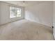 Large bedroom with window and carpeted floor at 388 Oakhaven Way, Villa Rica, GA 30180