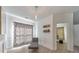 Bright living room with chaise lounge, wood floors, and neutral decor at 388 Oakhaven Way, Villa Rica, GA 30180