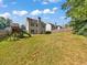 Large backyard with playset and houses in background at 388 Oakhaven Way, Villa Rica, GA 30180