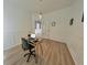 Home office with desk and chair in a bright room with wood floors at 388 Oakhaven Way, Villa Rica, GA 30180