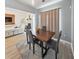 Bright dining room featuring a wood table and four chairs at 388 Oakhaven Way, Villa Rica, GA 30180