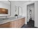 Elegant bathroom with double vanity, marble countertops, and a freestanding bathtub at 100 Ottley Ln, Atlanta, GA 30305