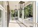 Spacious porch with white railings and elegant lighting at 100 Ottley Ln, Atlanta, GA 30305