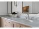 Modern bathroom with a double vanity, marble countertop, and sleek faucets at 100 Ottley Ln, Atlanta, GA 30305