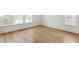 Light-filled living room showcasing gorgeous hardwood floors at 100 Ottley Ln, Atlanta, GA 30305