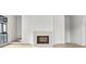 Bright living room featuring a modern fireplace and hardwood floors at 100 Ottley Ln, Atlanta, GA 30305