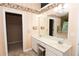 Bathroom with double sinks and a large mirror at 1001 S Creek Dr, Villa Rica, GA 30180