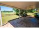 Covered patio with ceiling fan overlooking green space at 1001 S Creek Dr, Villa Rica, GA 30180