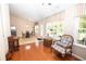 Bright breakfast nook with hardwood floors and view to backyard at 1001 S Creek Dr, Villa Rica, GA 30180
