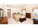 Bright bedroom featuring a large bed and ensuite bathroom access at 1001 S Creek Dr, Villa Rica, GA 30180