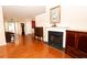 Fireplace, hardwood floors, and views into other rooms at 1001 S Creek Dr, Villa Rica, GA 30180
