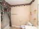 Bathroom with shower/tub combo and floral shower curtain at 1001 S Creek Dr, Villa Rica, GA 30180