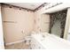 Clean bathroom with double vanity, toilet and shower/tub combo at 1001 S Creek Dr, Villa Rica, GA 30180