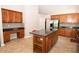 Kitchen boasts an island with seating and ample cabinetry at 1001 S Creek Dr, Villa Rica, GA 30180
