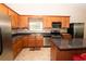 Updated kitchen with stainless steel appliances and granite countertops at 1001 S Creek Dr, Villa Rica, GA 30180