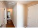 Bright hallway with hardwood floors and access to bedrooms at 1001 S Creek Dr, Villa Rica, GA 30180