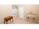 Cozy bedroom with a window, and antique wooden desk at 1001 S Creek Dr, Villa Rica, GA 30180