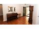 Bright entryway with hardwood floors, piano, and grandfather clock at 1001 S Creek Dr, Villa Rica, GA 30180