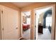 Hardwood floor hallway with doors to two bedrooms at 1001 S Creek Dr, Villa Rica, GA 30180