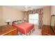 Relaxing bedroom with a ceiling fan and a queen-sized bed at 1001 S Creek Dr, Villa Rica, GA 30180
