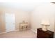 Bright bedroom with a secretary and nightstand at 1001 S Creek Dr, Villa Rica, GA 30180