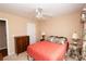 Comfortable bedroom with a ceiling fan and a queen-sized bed at 1001 S Creek Dr, Villa Rica, GA 30180