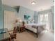 Bedroom with a double bed, desk and chair, and large windows at 1829 Buckhead Valley Ne Ln, Atlanta, GA 30324