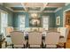 Elegant dining room boasts a coffered ceiling and large windows at 1829 Buckhead Valley Ne Ln, Atlanta, GA 30324