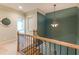 Upstairs hallway with access to bedrooms and a view of the lower level at 1829 Buckhead Valley Ne Ln, Atlanta, GA 30324