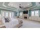 Luxurious main bedroom with fireplace and access to balcony at 1829 Buckhead Valley Ne Ln, Atlanta, GA 30324