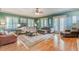 Spacious living room with hardwood floors, comfortable seating, and access to a patio at 1829 Buckhead Valley Ne Ln, Atlanta, GA 30324