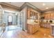 Butlers pantry with wood cabinets and granite countertop at 1829 Buckhead Valley Ne Ln, Atlanta, GA 30324