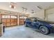Three-car garage with wood doors and ample space at 1829 Buckhead Valley Ne Ln, Atlanta, GA 30324