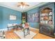 Bright home office with hardwood floors and ample built-in storage at 1829 Buckhead Valley Ne Ln, Atlanta, GA 30324