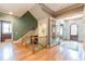 Elegant hardwood staircase with wrought iron railing at 1829 Buckhead Valley Ne Ln, Atlanta, GA 30324