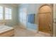 Bathroom with walk-in shower and built-in seating at 1829 Buckhead Valley Ne Ln, Atlanta, GA 30324