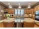Kitchen island with granite countertops and seating for two at 1829 Buckhead Valley Ne Ln, Atlanta, GA 30324