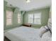 Bright bedroom with a king-size bed and large windows at 1829 Buckhead Valley Ne Ln, Atlanta, GA 30324