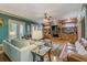 Bright living room featuring a stone fireplace, built-in shelving, and hardwood floors at 1829 Buckhead Valley Ne Ln, Atlanta, GA 30324