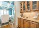 Well-appointed butlers pantry with granite countertops and ample storage at 1829 Buckhead Valley Ne Ln, Atlanta, GA 30324